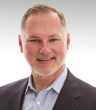 Dr. Craig Escude, IntellectAbility | Healthcare Tech Outlook | Top Health Risk Screening Tool