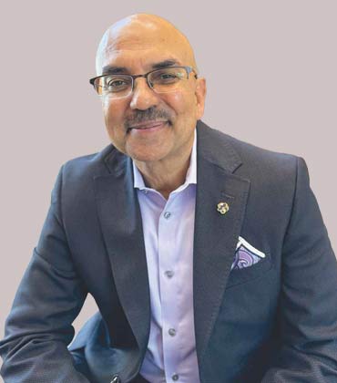 Dr. Raj Lakhanpal, SpectraMedix | Healthcare Tech Outlook | Top Value-Based Contract Health Plan Analytics Services Provider