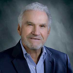 Peter Gombrich, OncoGenesis | Healthcare Tech Outlook | Top  Oncology Solutions Companies